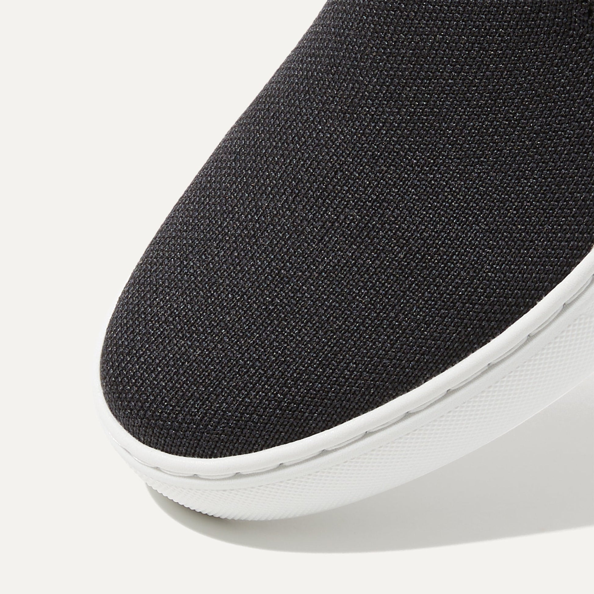 Rothy's The Original Slip On Sneaker in Black Solid