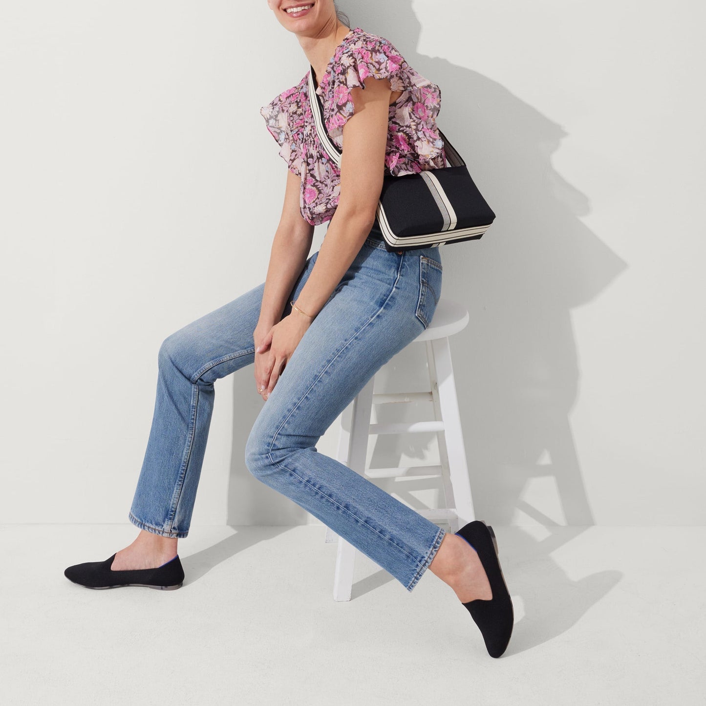 Rothy's The Casual Crossbody in Black and Ivory Stripe