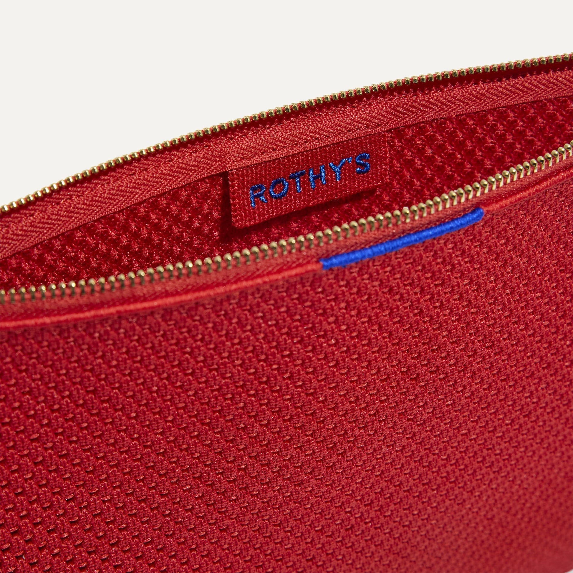 Rothy's The Convertible Clutch in Scarlet Open-Knit